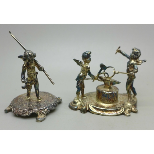 910C - Two small silver cherub figures on stands, 72g