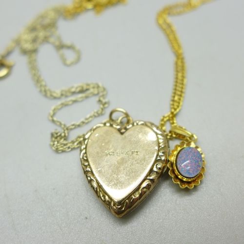 930 - A rolled gold bangle, a 9ct gold back and front locket and a triplet opal pendant