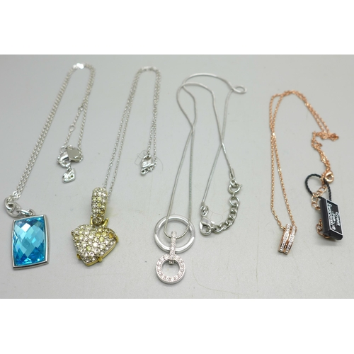 937 - Four Swarovski pendants and chains