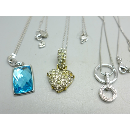 937 - Four Swarovski pendants and chains