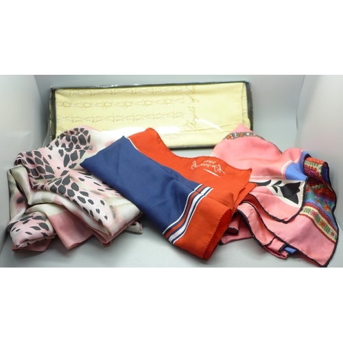 942 - A collection of scarves including Jaeger, French and Italian scarves, etc.