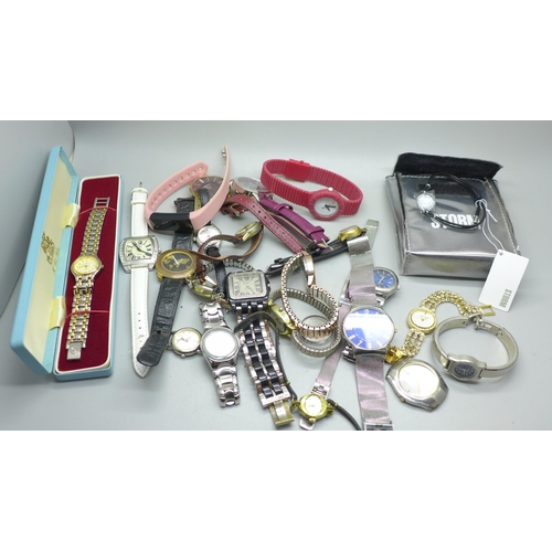 958 - A collection of lady's watches including Ellesse, Sekonda, etc.