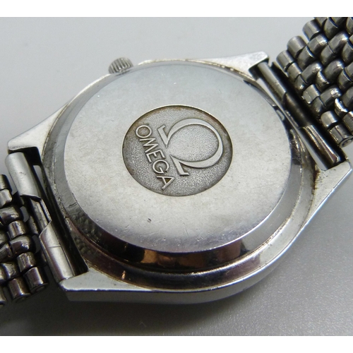 972 - An Omega quartz day/date wristwatch on an associated strap