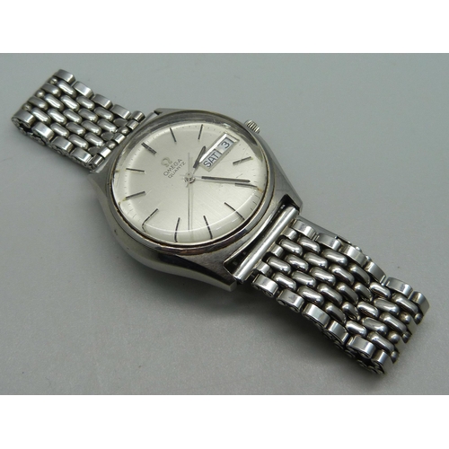 972 - An Omega quartz day/date wristwatch on an associated strap