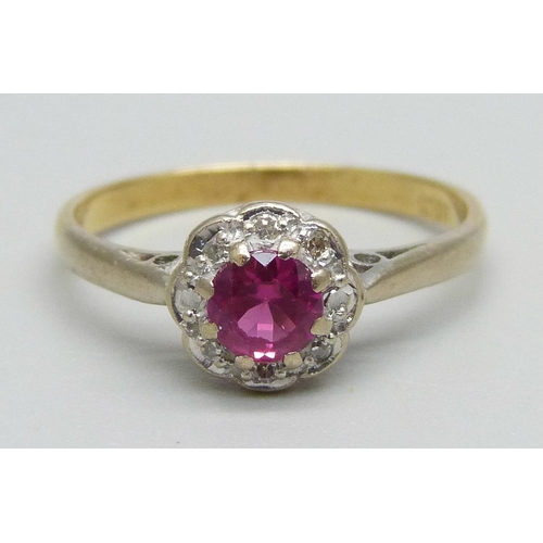 974 - An 18ct gold, diamond and ruby ring, 2.9g, P