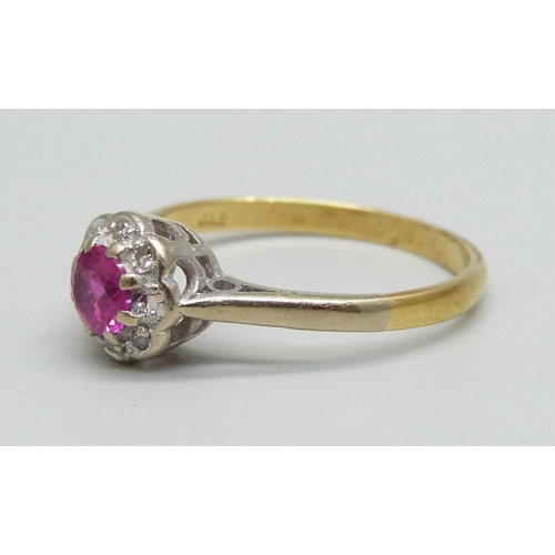 974 - An 18ct gold, diamond and ruby ring, 2.9g, P