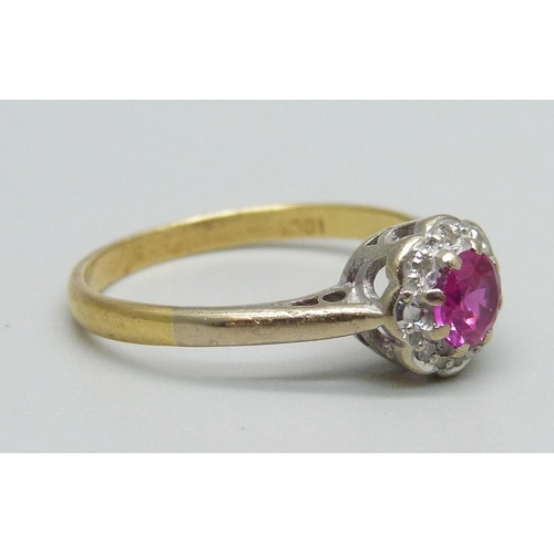 974 - An 18ct gold, diamond and ruby ring, 2.9g, P