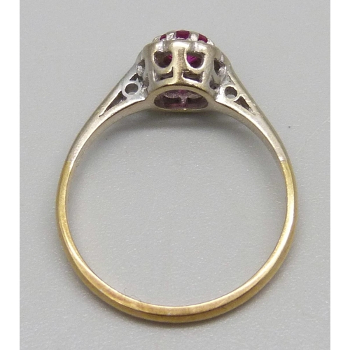 974 - An 18ct gold, diamond and ruby ring, 2.9g, P