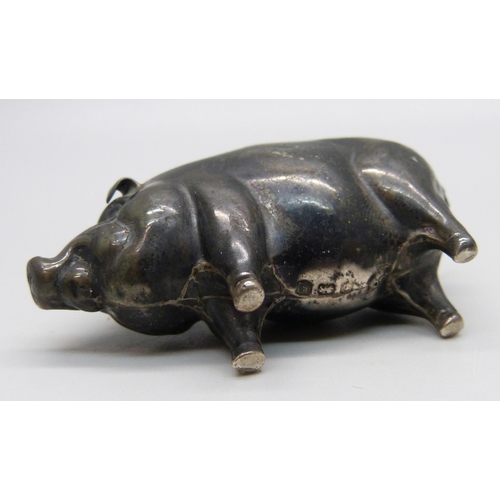 978 - A silver pin cushion in the form of a pig, Birmingham, 1906, 35g, 5.5cm long