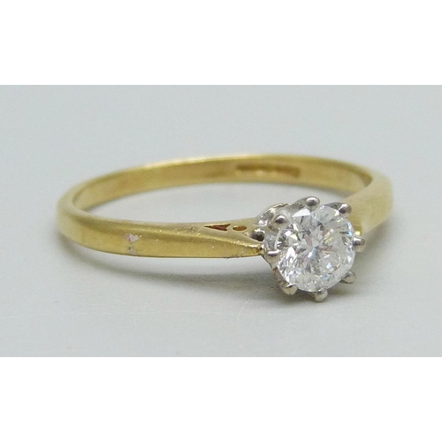 988 - An 18ct gold and diamond ring, 0.33ct, 2.5g, N/O