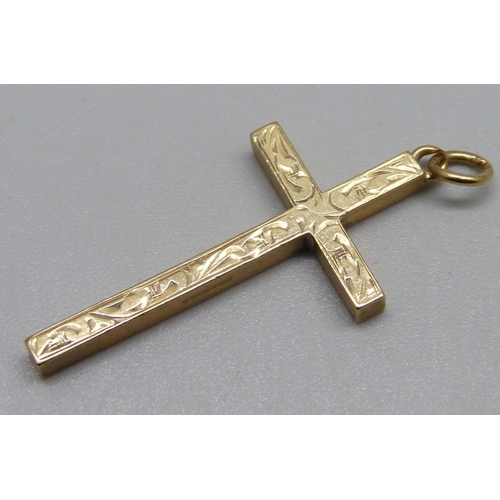 991 - A 9ct gold cross pendant, 3.4g, 3.8cm including loop