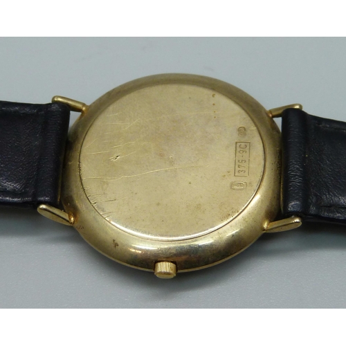 992 - A 9ct gold Jean Jacot wristwatch, (some scratches to case back)