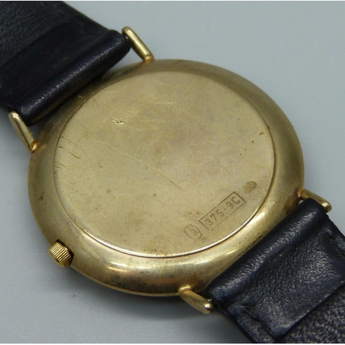 992 - A 9ct gold Jean Jacot wristwatch, (some scratches to case back)