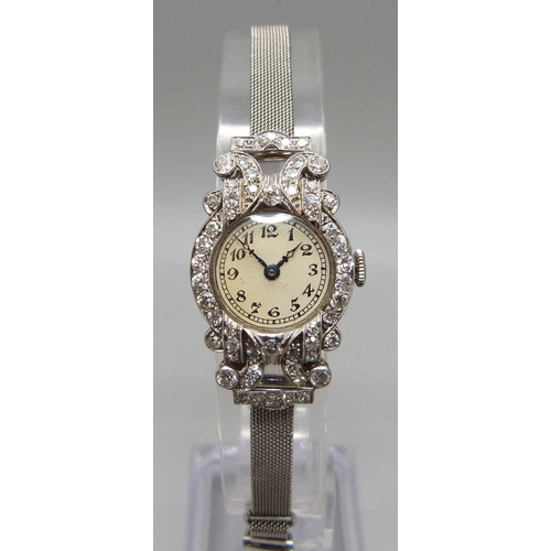 997 - A lady's Art Deco platinum and diamond set cocktail wristwatch, inscription to case back 'D.M.S. 2:1... 