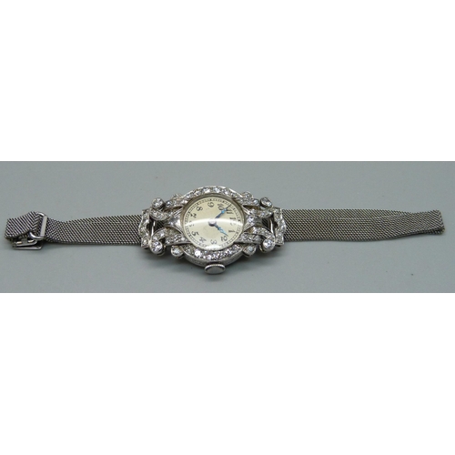 997 - A lady's Art Deco platinum and diamond set cocktail wristwatch, inscription to case back 'D.M.S. 2:1... 