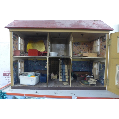 2088 - A large dolls house with some furniture