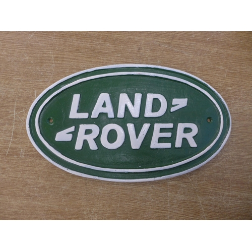 2118 - A cast metal Land Rover plaque * this lot is subject to VAT