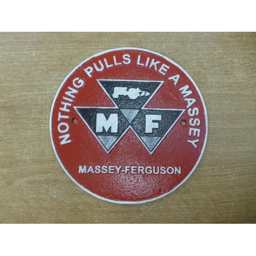 2120 - A cast metal Massey Ferguson plaque * this lot is subject to VAT