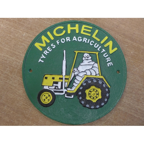 2121 - A cast metal Michelin cast plaque * this lot is subject to VAT