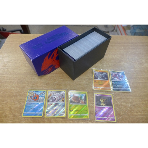 2129 - A box of over 500 Pokemon trading cards