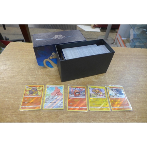 2130 - A box of over 500 Pokemon trading cards