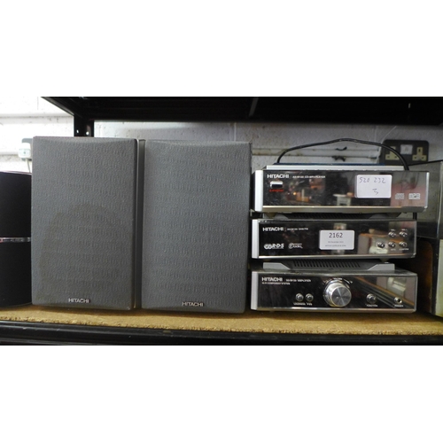 2162 - A stereo lot, including:- Hitachi CD/MP3 player, Hitachi DAB/FM, Hitachi amplifier - speakers includ... 