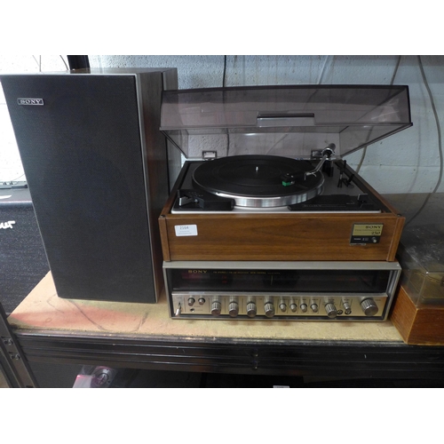 2164 - A Sony 230 stereo turntable system, STR-6046A solid state amplifier/radio and a pair of Sony speaker... 