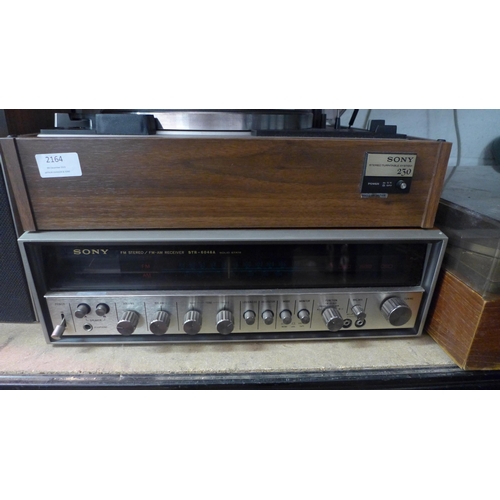 2164 - A Sony 230 stereo turntable system, STR-6046A solid state amplifier/radio and a pair of Sony speaker... 