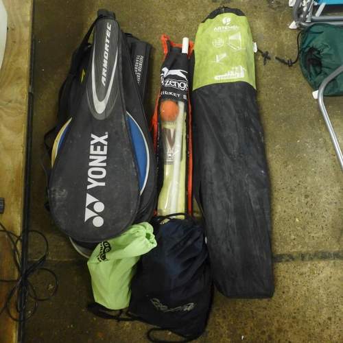 2347 - An Artengo Outcourt 3m Speed Net 3 tennis net and a quantity of tennis and squash rackets, a cricket... 