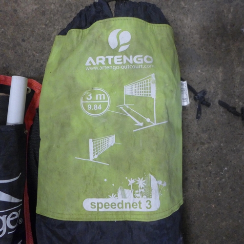 2347 - An Artengo Outcourt 3m Speed Net 3 tennis net and a quantity of tennis and squash rackets, a cricket... 