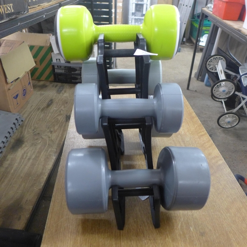 2366 - A set of Opti dumbbells and rack