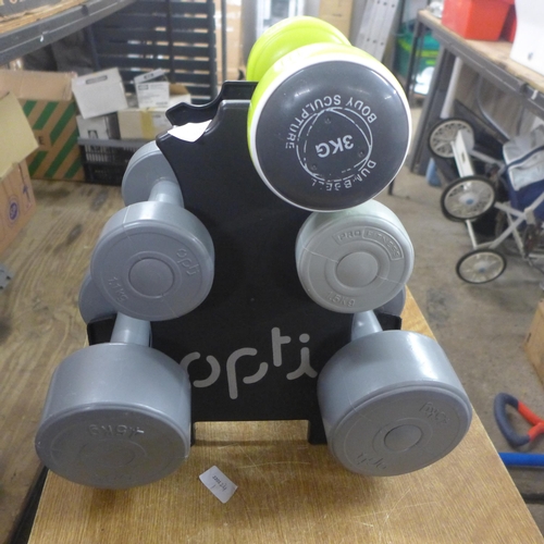 2366 - A set of Opti dumbbells and rack