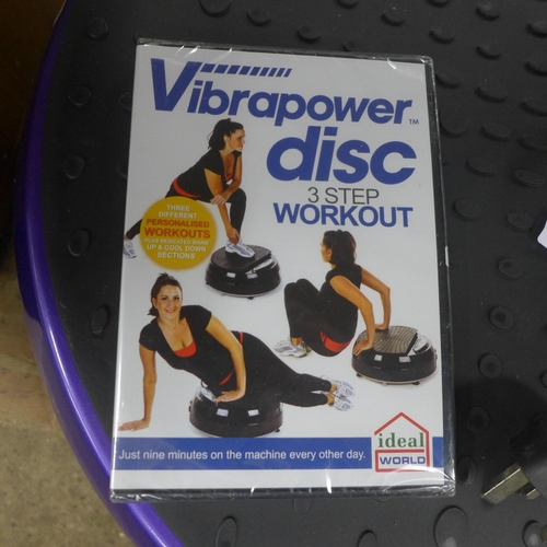 2376 - A Vibrapower disc wobble board with three-step workout disc