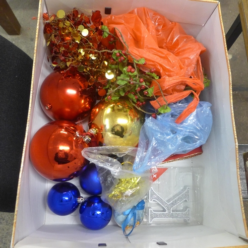 2379 - A large quantity of Christmas decorations including large baubles, light up tinsel, Christmas gift b... 