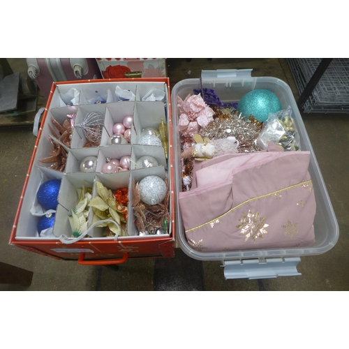 2380 - A large quantity of Christmas decorations including baubles, tree skirts, tinsel, etc.