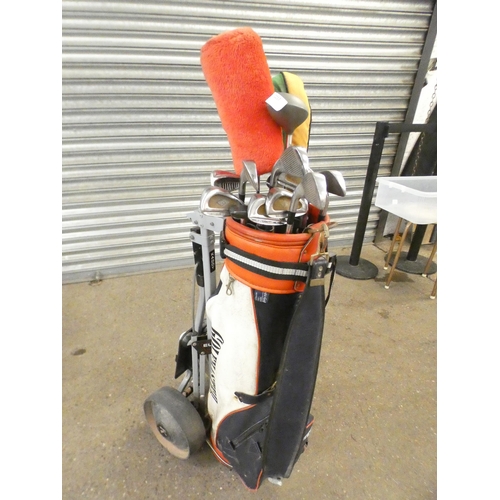 2217 - A Europa Kaddy, a Golfmaster golf bag and a quantity of golf clubs including G's 'Big Gun' and a qua... 