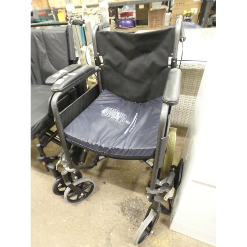 2251 - A Roma Medical small-wheeled wheelchair with seat cushion and foot rests