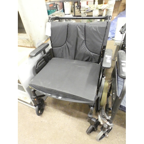 2252 - An Invacare small-wheeled wheelchair with seat cushion