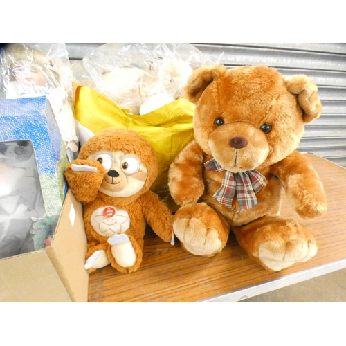 2315 - A box of dolls and soft toys, boxed & bagged