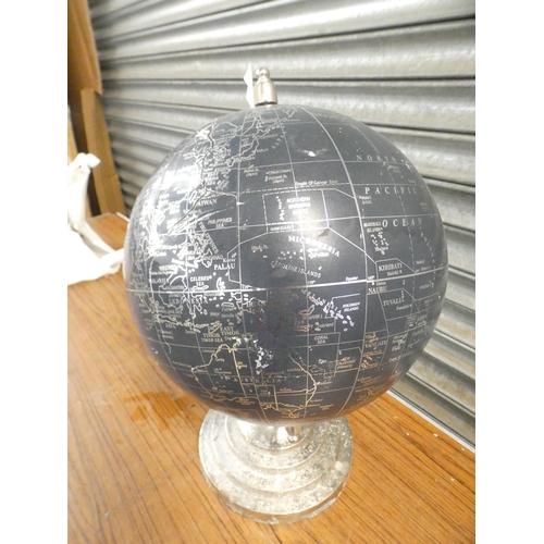 2319 - A navy blue and silver rotating globe