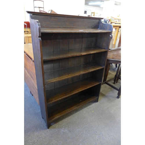 105 - An Edward VII oak open bookcase