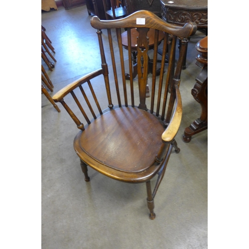 113 - An Edward VII beech elbow chair