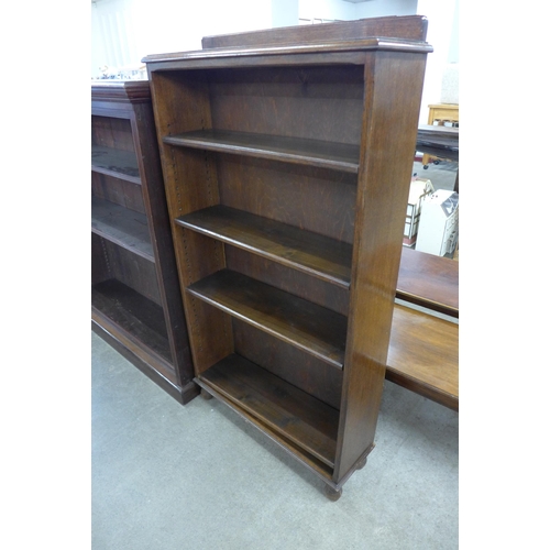 118 - A tall early 20th Century oak open bookcase