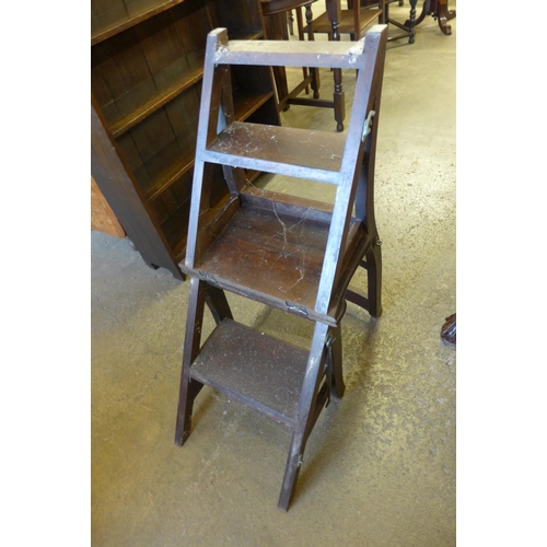 133 - A hardwood metamorphic library chair