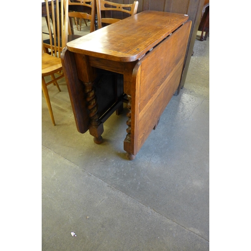 138 - An oak barleytwist gateleg table