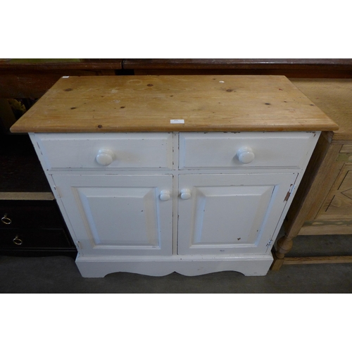 142 - A small painted pine sideboard