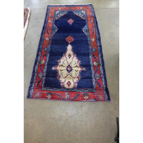 150 - An Iranian blue ground prayer rug, 205 x 101cms