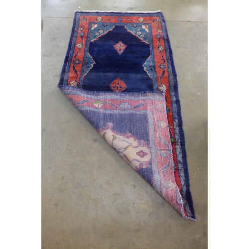 150 - An Iranian blue ground prayer rug, 205 x 101cms