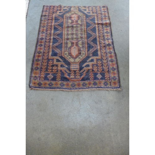 151 - A Pakistani blue ground rug, 137 x 86cms