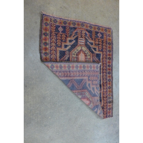 151 - A Pakistani blue ground rug, 137 x 86cms